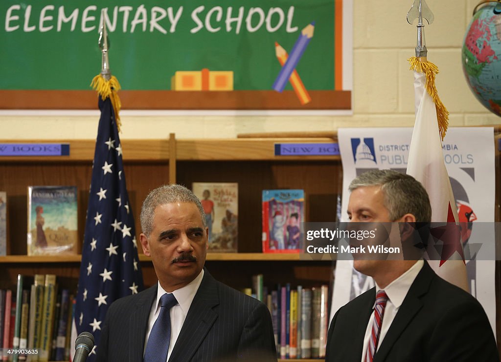 Eric Holder And Arne Duncan Visit Washington DC Elementary School