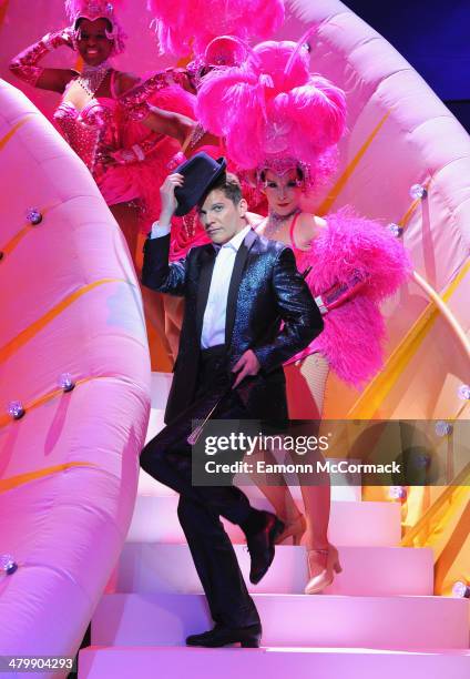 Nigel Harman plays 'Simon' during a photocall for "I Can't Sing! The X Factor Musical" at London Palladium on March 21, 2014 in London, England.