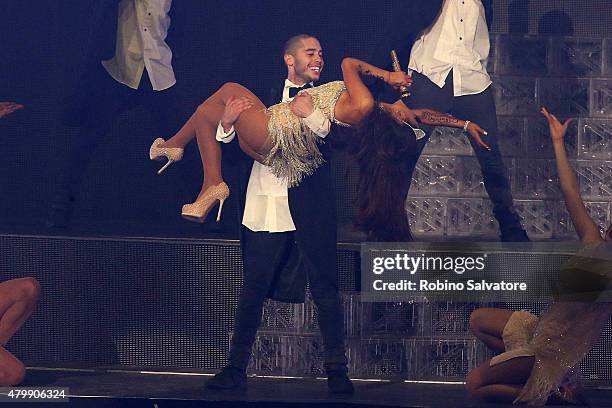 Ariana Grande performs on stage with her backing dancer and rumored boyfriend Ricky Alvarez on June 25, 2015 in Milan, Italy.