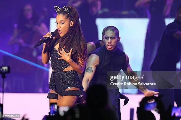 Ariana Grande performs on stage with her backing dancer and rumored boyfriend Ricky Alvarez on June 25, 2015 in Milan, Italy.