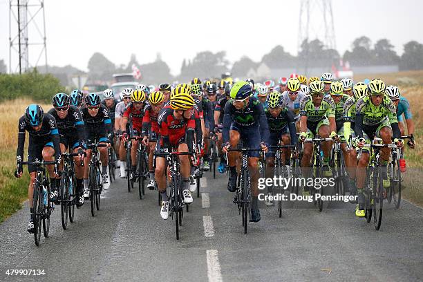 The riders from Team Sky, BMC Racing Team, Movistar Team and Tinkhoff-Saxo work at the front of the peloton during stage five of the 2015 Tour de...