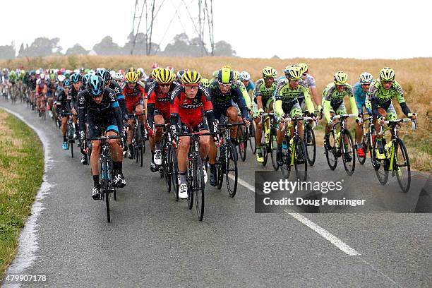 The riders from Team Sky, BMC Racing Team, Movistar Team and Tinkhoff-Saxo work at the front of the peloton during stage five of the 2015 Tour de...