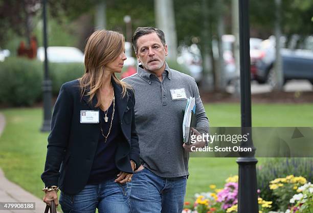 Dan Gilbert, founder and chairman of Rock Ventures and Quicken Loans attend the Allen & Company Sun Valley Conference with Jennifer Gilbert on July...