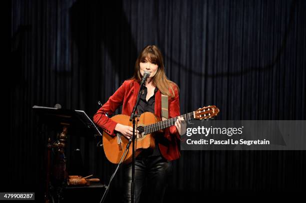 Carla Bruni performs on stage at L'Olympia on March 11, 2014 in Paris, France.