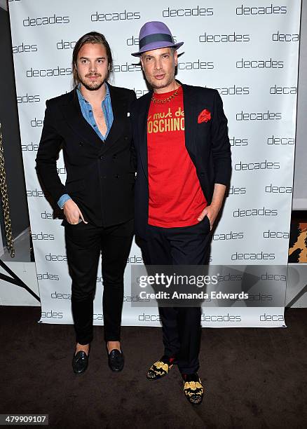 Shoe designer Louis Leeman and Decades owner Cameron Silver arrive at the Decades: Les Must De Moschino event at Decades on March 20, 2014 in Los...