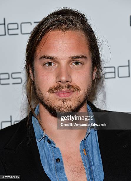 Shoe designer Louis Leeman arrives at the Decades: Les Must De Moschino event at Decades on March 20, 2014 in Los Angeles, California.