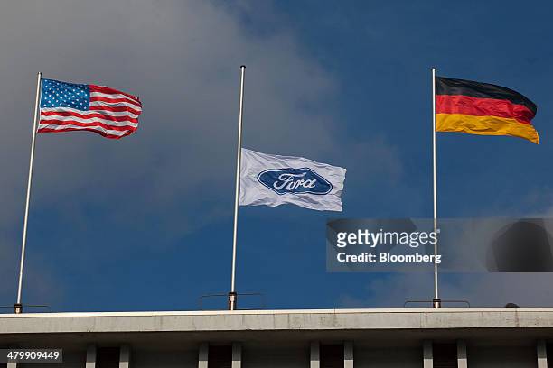 Ford Motor Co. Flag flies at half mast, center, following the recent death of Willliam Clay Ford, the last surviving grandchild of Ford founder Henry...