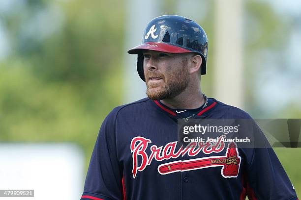 Ryan Doumit of the Atlanta Braves advances the runner in the seventh inning against the New York Mets during a spring training game at Tradition...