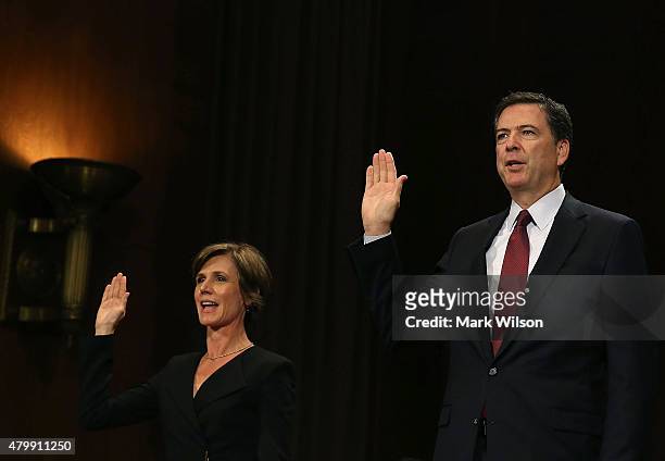 Director James Comey and Deputy Attorney General Sally Quillian Yates are sworn during a Senate Judiciary Committee hearing on Capitol Hill, July 8,...