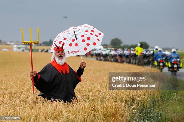 Dieter "Didi" Senft the self styled "Devil" of the Tour de France cheers on the riders during stage five of the 2015 Tour de France, a 189.5km stage...