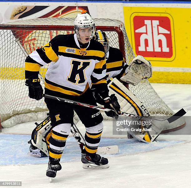 Evan McEneny of the Kingston Frontenacs watches the play against the Mississauga Steelheads during game action on March 16, 2014 at the Hershey...