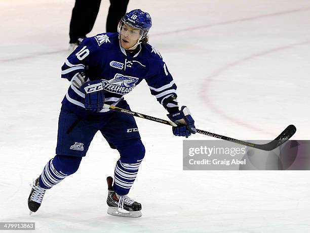 Andrew Goldberg of the Mississauga Steelheads skates up ice against the Kingston Frontenacs during game action on March 16, 2014 at the Hershey...