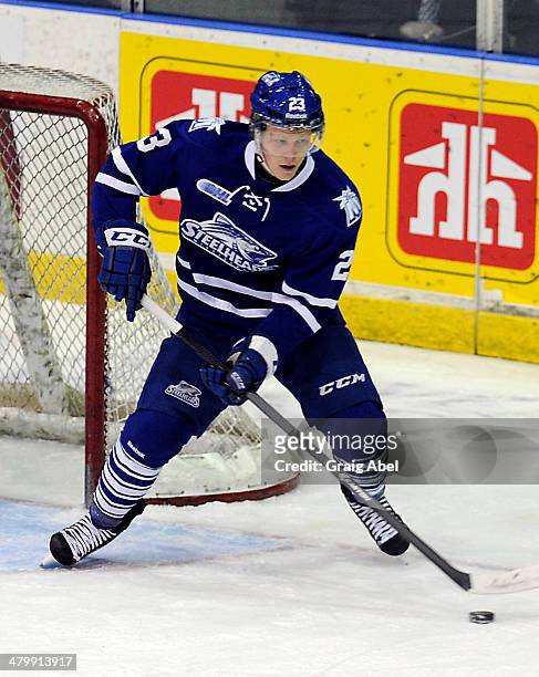 Stefan Leblanc of the Mississauga Steelheads controls the puck against the Kingston Frontenacs during game action on March 16, 2014 at the Hershey...