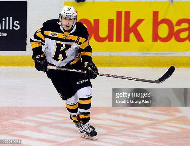 Ryan Kujawinski of the Kingston Frontenacs skates up ice against the Mississauga Steelheads during game action on March 16, 2014 at the Hershey...