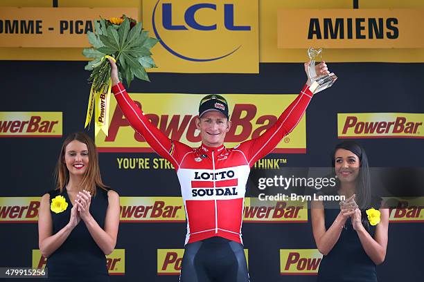 Andre Greipel of Germany and Lotto-Soudal celebrates on the podium following his victory during stage five of the 2015 Tour de France, a 189.5km...