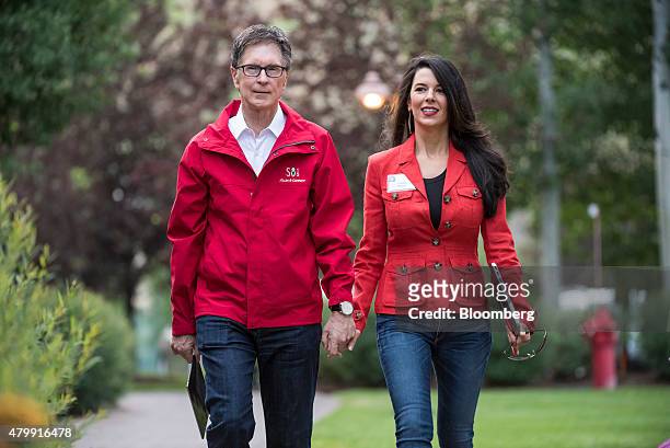John Henry, owner of the Boston Red Sox, and wife Linda Henry arrive for a morning session during the Allen & Co. Media and Technology Conference in...