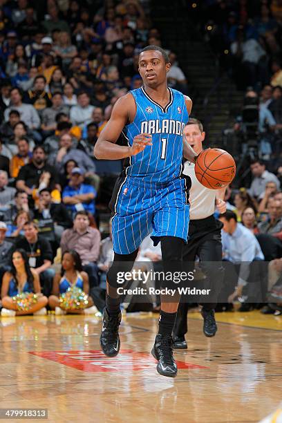 Doron Lamb of the Orlando Magic dribbles against the Golden State Warriors on March 18, 2014 at Oracle Arena in Oakland, California. NOTE TO USER:...