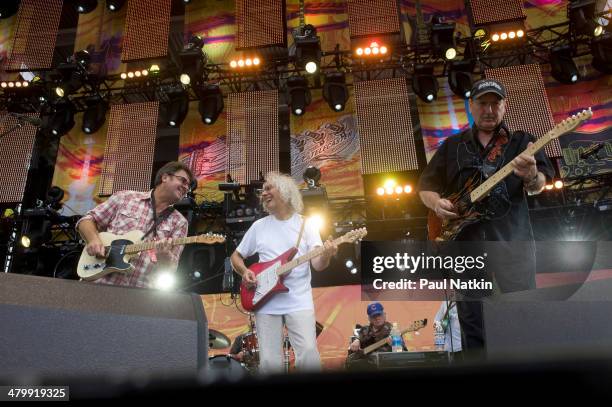 From left, musicians Vince Gill, Albert Lee, and James Burton perform onstage at Eric Clapton's Crossroads Guitar Festival, held at Toyota Park,...