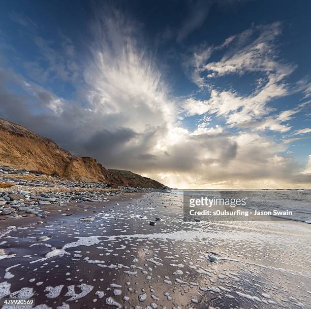 cloudburst over compton bay - isle of wight stock pictures, royalty-free photos & images