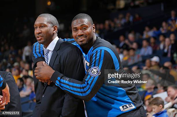 Head coach Jacque Vaughn and Jason Maxiell of the Orlando Magic while facing the Golden State Warriors on March 18, 2014 at Oracle Arena in Oakland,...