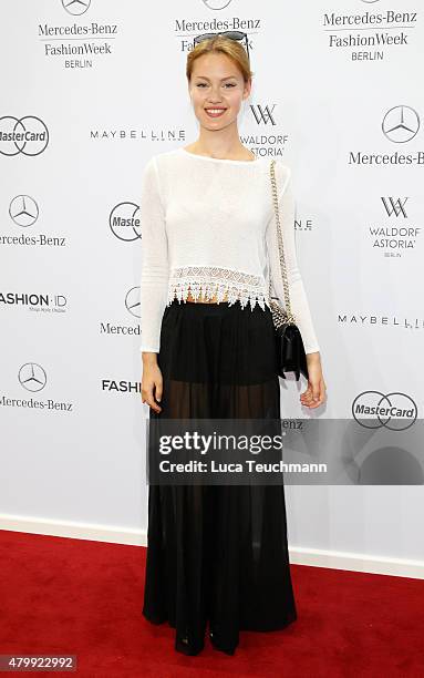 Guest attends the Rebekka Ruetz show during the Mercedes-Benz Fashion Week Berlin Spring/Summer 2016 at Brandenburg Gate on July 8, 2015 in Berlin,...