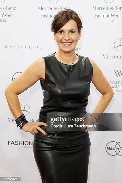 Guest attends the Rebekka Ruetz show during the Mercedes-Benz Fashion Week Berlin Spring/Summer 2016 at Brandenburg Gate on July 8, 2015 in Berlin,...