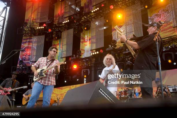 From left, musicians Vince Gill, Albert Lee, and James Burton perform onstage at Eric Clapton's Crossroads Guitar Festival, held at Toyota Park,...