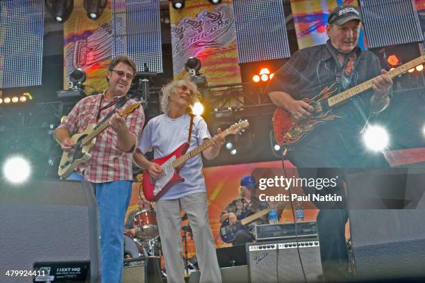 From left, musicians Vince Gill, Albert Lee, and James Burton perform onstage at Eric Clapton's Crossroads Guitar Festival, held at Toyota Park,...