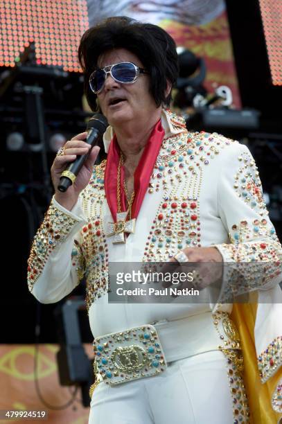 Dressed as Elvis Presley, actor Bill Murray performs onstage at Eric Clapton's Crossroads Guitar Festival, held at Toyota Park, Bridgeview, Illinois,...