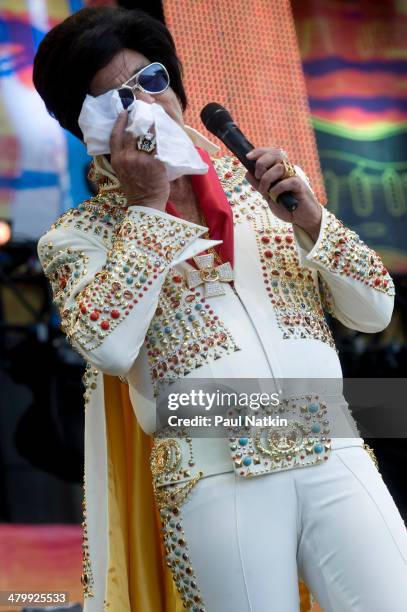 Dressed as Elvis Presley, actor Bill Murray performs onstage at Eric Clapton's Crossroads Guitar Festival, held at Toyota Park, Bridgeview, Illinois,...