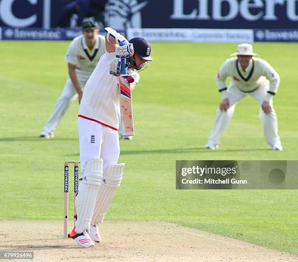 Stuart Broad of England takes evasive action from a bouncer during day one of the first 1st Investec Ashes Test match, at SSE Swalec Ground on July...