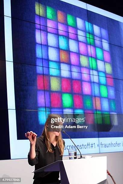 Veronika Aumann of the design group Screenstoff, designer of textile display clothing, speaks at the Microsoft Wearable IT Fashion Tech Award during...