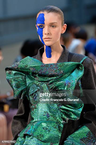 Model walks the runway during the Maison Margiela show as part of Paris Fashion Week Haute Couture Fall/Winter 2015/2016 on July 8, 2015 in Paris,...