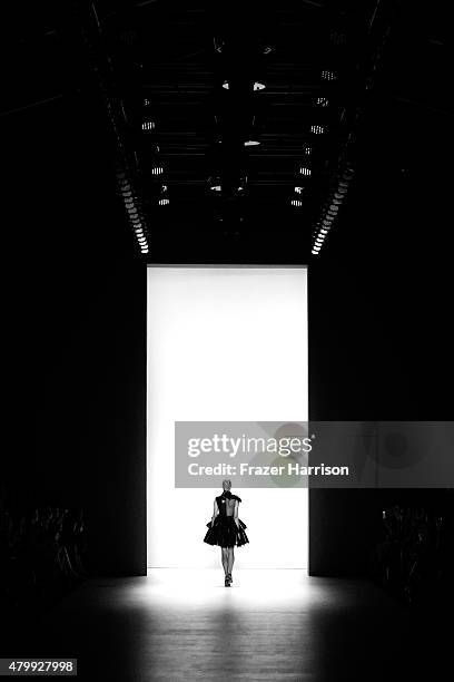 Model is seen on the runway during the Mercedes-Benz Fashion Week Berlin Spring/Summer 2016 at Brandenburg Gate on July 8, 2015 in Berlin, Germany.