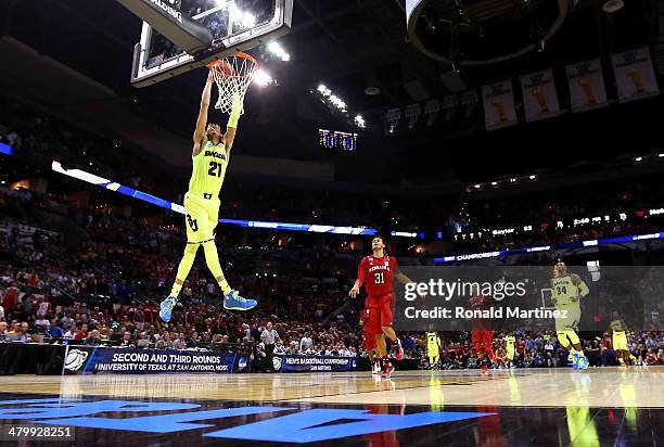 Isaiah Austin of the Baylor Bears dunks in the second half against the Nebraska Cornhuskers during the second round of the 2014 NCAA Men's Basketball...