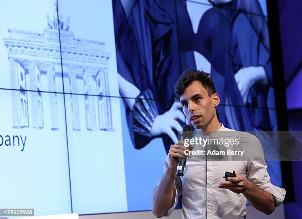 Christian Hartung of Vojt Studios speaks about his digital fashion project at the Microsoft Wearable IT Fashion Tech Award during Mercedes-Benz...