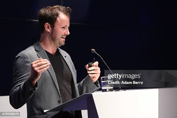 Fabian Hemmert speaks about the Datatouch presentation project at the Microsoft Wearable IT Fashion Tech Award during Mercedes-Benz Fashion Week...