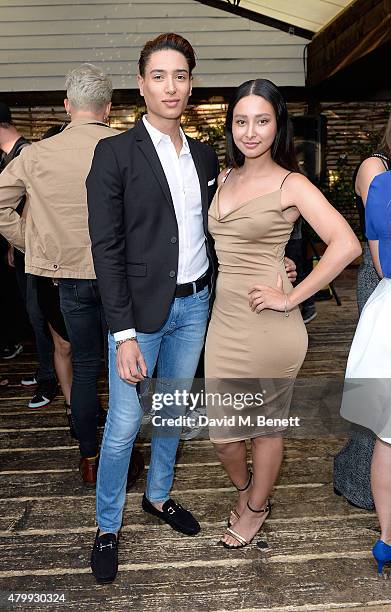 Natt Weller and Leah Weller attend the Warner Summer Party in association with British GQ at Shoreditch House on July 8, 2015 in London, England.