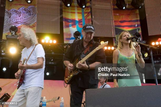 From left, musicians Albert Lee, James Burton, and Sheryl Crow perform onstage at Eric Clapton's Crossroads Guitar Festival, held at Toyota Park,...