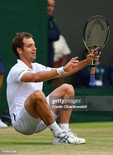 Richard Gasquet of France celebrates at match point after winning his Gentlemens Singles Quarter Final match against Stanislas Wawrinka of...