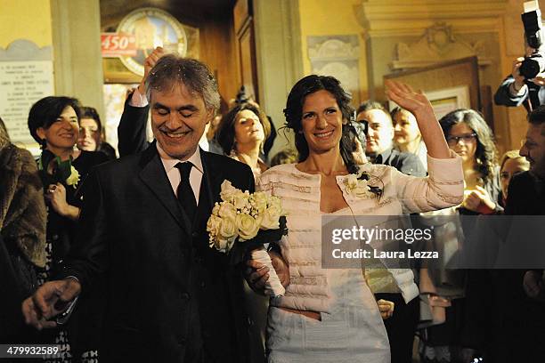 Italian singer Andrea Bocelli and Veronica Berti leave the Sanctuary of Madonna di Montenero after their wedding on March 21, 2014 in Livorno, Italy.