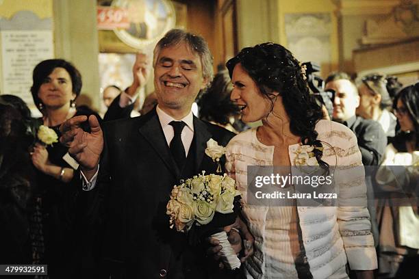 Italian singer Andrea Bocelli and Veronica Berti leave the Sanctuary of Madonna di Montenero after their wedding on March 21, 2014 in Livorno, Italy.