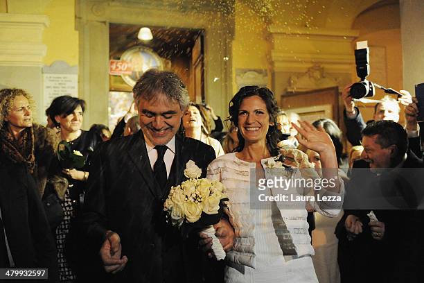 Italian singer Andrea Bocelli and Veronica Berti leave the Sanctuary of Madonna di Montenero after their wedding on March 21, 2014 in Livorno, Italy.