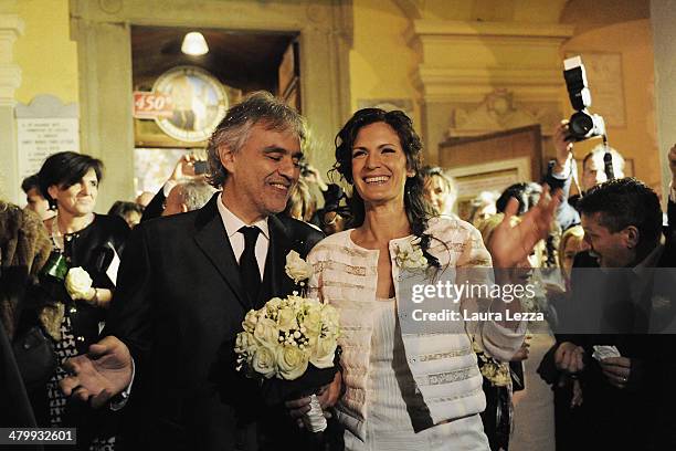 Italian singer Andrea Bocelli and Veronica Berti leave the Sanctuary of Madonna di Montenero after their wedding on March 21, 2014 in Livorno, Italy.