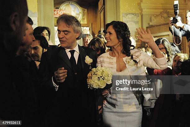 Italian singer Andrea Bocelli and Veronica Berti leave the Sanctuary of Madonna di Montenero after their wedding on March 21, 2014 in Livorno, Italy.