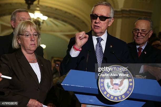 Senate Minority Leader Sen. Harry Reid speaks as Senate Minority Whip Sen. Richard Durbin , Sen. Patty Murray , and Sen. Charles Schumer listen...