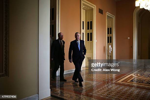 Senate Majority Leader Sen. Mitch McConnell and Sen. Lamar Alexander come out after the weekly Republican Policy Luncheon July 8, 2015 at the U.S....