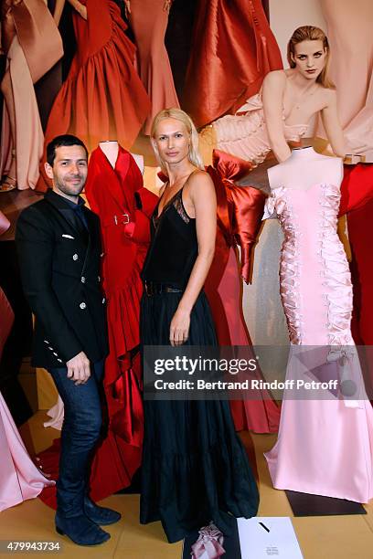 Fashion Designer Alexis Mabille and Model Inga Savits attend the Presentation of the Alexis Mabille Haute Couture Fall/Winter 2015/2016 collection as...