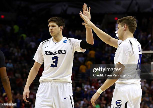 Doug McDermott and Grant Gibbs of the Creighton Bluejays celebrate after a play in the second half against the Louisiana Lafayette Ragin Cajuns...