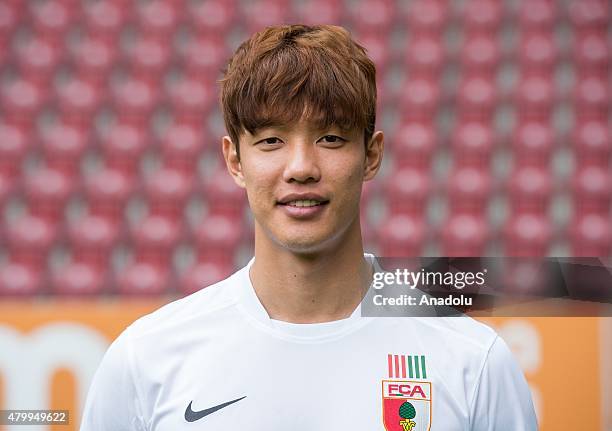 Jeong-Ho Hong of Augsburg poses during the official photo shooting of the Bundesliga soccer Team 2015/16 of FC Augsburg at the WWK Arena in Augsburg,...